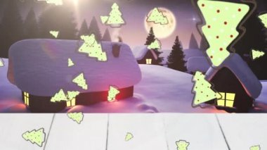 Kış manzarası ve gece gökyüzüne karşı ahşap tahta üzerine düşen çoklu noel ağacı simgeleri. Noel şenliği ve kutlama konsepti