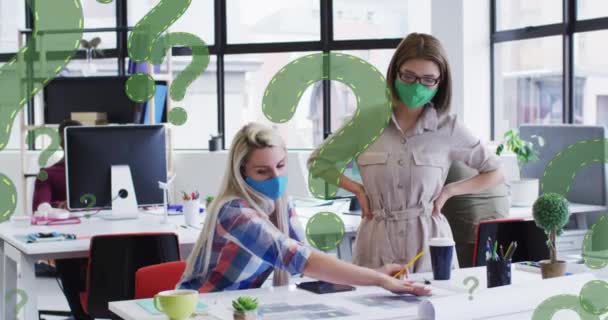 Animation Question Marks Diverse Businesswomen Wearing Face Masks Using Computer — Stock Video