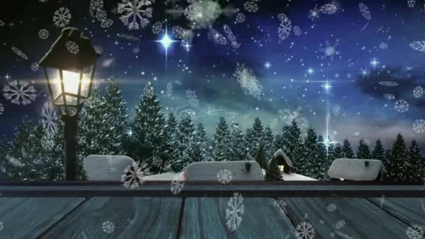 雪花飘扬在木板上 映衬着冬日的风景和夜空中闪亮的星星 圣诞节的庆祝和庆祝概念 — 图库视频影像