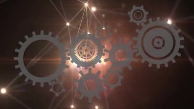 Hareket eden dişlilerin animasyonu ve kahverengi arkaplandaki bağlantı ağı. dijital arayüz ve teknoloji konsepti dijital olarak oluşturulmuş video.