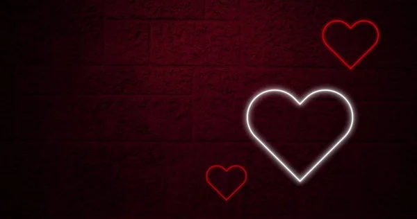 红色和白色的霓虹灯在黑暗的砖墙上闪烁着 情人节 爱情与浪漫的概念 数码生成的图像 — 图库照片