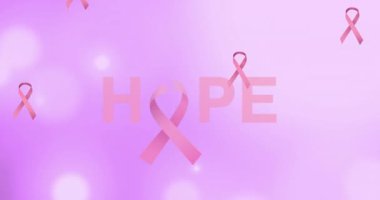 Göğüs kanseri farkındalığı metninin mavi arka plana düşen pembe kurdeleler üzerine animasyonu. Göğüs kanseri pozitif farkındalık kampanyası konsepti dijital olarak üretildi.