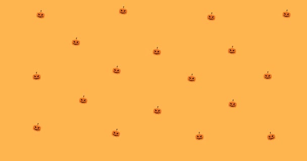 Animation Mehrerer Kürbisse Auf Orangefarbenem Hintergrund Halloween Tradition Und Festkonzept — Stockvideo