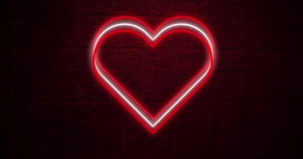 暗いレンガの壁に点滅する赤と白のネオンの心のイメージ バレンタインデー愛と恋愛の概念デジタル的に生成されたイメージ — ストック写真