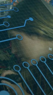 Animation of digital interface and data processing over caucasian female server room worker. Global business, finances, data processing and digital interface concept digitally generated video.