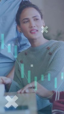 Animation of data processing over diverse business people working in office. Global business, finances, computing and data processing concept digitally generated video.