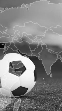 Animation of moving world map over football ball. World cup soccer concept digitally generated video.