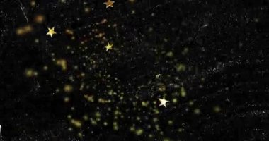 Soldan parlayan zerreler ortaya çıktıktan sonra içeri doğru dönen altın yıldızlar parlayan çekirdeği oluşturur. Soyut, kozmik, aydınlık, cazibe, hareket, zarafet, ışıltı