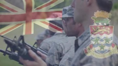 Ateşleme pozisyonu alan altı asker, askeri tatbikatta hareketli bayrak kaplamalarıyla aynı hizada duruyorlar. Askeri, disiplin, kamuflaj, takım çalışması, yiğitlik, hassasiyet, vatanseverlik