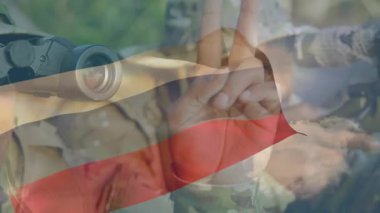 Soldier using binoculars sending hand signal and partner raising scoped rifle targeting in defense. Military, reconnaissance, camouflage, tactical, precision, outdoor, teamwork