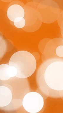Sıcak kahverengi ve beyaz yuvarlak bokeh ışıkları soyut animasyon etkisi yaratıyor. arkaplan, parlama, aydınlatma, desen, doku