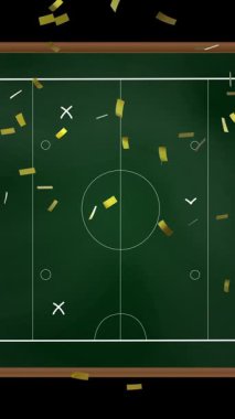 Siyah arka planda oyun planının üzerine konfeti animasyonu. Spor ve yarışma konsepti dijital olarak oluşturulmuş video.