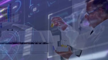 Laboratuar analizi için test tüplerini inceleyen ve yükleyen bilim adamları% 29 oranında grafikle örtüşüyor. Araştırma, yenilik, teknoloji, kesinlik, deney, keşif, bilim