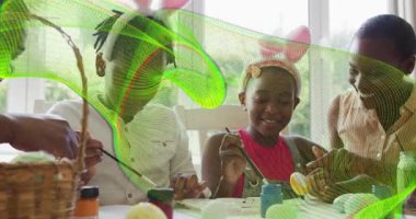 Annem boya kavanozları uzatıyordu. Paskalya yumurtası tablolarında renkli damlalar vardı. Aile, yaratıcılık, sanat, diy, kutlama, bağ, festival