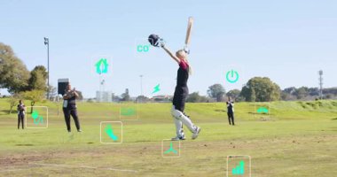 Batter, teknolojideki ölçümleri gösteren yüzen sürdürülebilirlik simgeleriyle art arda sopa kaldırıyor. Atletik, takım çalışması, açık hava, performans, çevre dostu, kutlama, enerjik