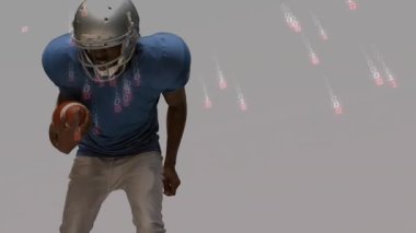 Top taşıyıcı, savunma hücumunun ortasında, dijital teknoloji kaplaması altında sert silahlarla mücadele ediyor. Sporcu, spor, aksiyon, dijital, teknoloji, hareket, rekabet