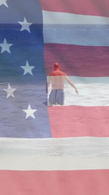 Yazın Amerika bayrağının Kafkasyalı bir adamın üzerinde dalgalanması. Usa, Amerikan vatanseverliği, ulusal bayrak ve yaşam tarzı konsepti dijital olarak oluşturulmuş video.