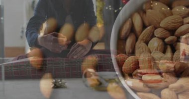 Ev aşçısı badem topluyor, fındıkkıranla kabuğu kırıyor ve yüzen bademlerle şenlik hazırlıyor. Şen, samimi, sıcak, doğal, yaşam tarzı, kırsal, mevsimsel