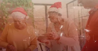 Mutfak adasında toplanmak, kıdemli arkadaşlar tatil salatası pişirmek, dünya haritasını canlandırmak. Kutlama, mutfak, yoldaşlık, şenlik, misafirperverlik, aile, aşçılık.