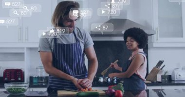 Havuç doğrayan bir adam, mutfakta esrar karıştıran bir kadın pazarlama ikonları olarak nişanı güncelliyor. Aşçılık, işbirliği, yerli, canlı, bağlantı, teknoloji, yaşam tarzı