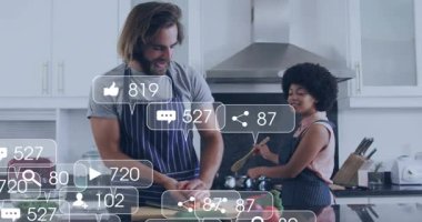 Havuç doğrayan ve canlandırılmış simgelerle adada karıştırıp havuç yiyen çiftler. Mutfak, takım çalışması, modern, yerli, enerjik, işbirliği, beslenme