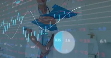 Doctor bringing clipboard, nurse marking while finance charts overlaying medical records. Physician, clinician, teamwork, clinic, stethoscope, overlay, analytics