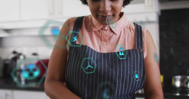 Yüzen sürdürülebilirlik simgelerini etkinleştirerek yeşil yemek pişirme konusunda karıştırıcı aşçı karışımı. Çevre bilinci, sağlıklı yaşam tarzı, modern, bilinçli, yenilikçi, ev