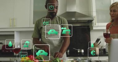 Ev yemeği, sebze doğrama, sürdürülebilirlik ikonları izleme, veri eşleri salata atma. Sağlıklı yaşam tarzı, ev hayatı, modern mutfak, dijital teknoloji, çevresel farkındalık