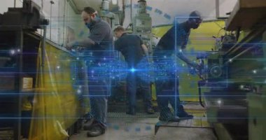 İstasyondaki üç teknisyen, sağdaki teknisyen mavi AR 'ı çalıştırıyor ve kontrol için parçaları birleştiriyor. Makinistler, atölye, metal işçiliği, değirmen, torna, işbirliği, takım çalışması