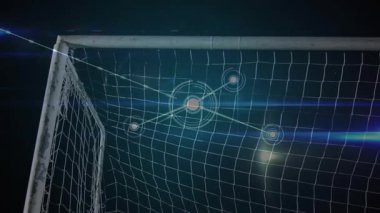 Kaleci gelen topu takip ediyor, yüksek çözünürlüklü düğümler spor teknolojisi için ağ haritalarken zamanda sıçrama tasarrufu yapıyor. Kaleci, kaleci, eldiven, stadyum, gece, kaplama, fütüristik