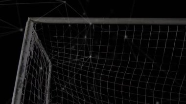 Kaleci topu takip ediyor, zamanlama sıçraması, atışı saptırma, kaleyi koruma, parçacık ağı. Futbol, kavşak, kaydet, spor, arena, ışılda, hareket