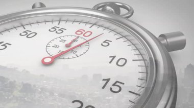 Başlarken saat yönünden geçen uzun kırmızı el, geçen saniyeleri on beşe kadar gösteriyor. Kronometre, krom, metalik, yakın çekim, stüdyo, doymamış