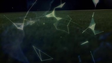 14 numaralı oyuncu spor stadyumunda kaydıktan sonra topu temizliyor, dünya çapındaki dönen oyuncular. Dijital, küre, çokgen, parçacıklar, gece, arena, zift