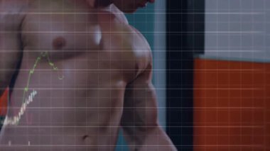 Dambıl kıvıran bir adam, hareketli grafikler sağlık teknolojisi için pazıların tepelerini incelerken temsilcilere başlıyor. Spor salonu, zindelik, güç, kaldırma, üst üste koyma, veri, ölçüm