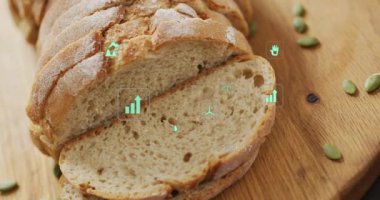 Dilimlenmiş somun üzerinde HUD simgeleri yükseliyor, tohum tohumu ve ekolojik ölçümleri göstererek sağa doğru tarama yapıyor. Ekmek, tohum, çuval bezi, tahta, kabuk, kırıntı, fırın