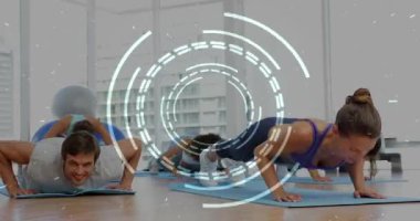 Trio, HUD 'nin ortaya çıkışına mavi minderlerde sürekli şınav çekmesine, bina uygunluğuna tepki veriyor. Plank, egzersiz, grup, stüdyo, eğitim, parlak, üst üste