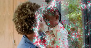 Kadın çocuğu kaldırıyor çocuk buruna dokunuyor sağlık için kırmızı deniz mavisi yüzler boyunca sürükleniyor. Bağlanma, şefkat, ebeveyn, bakıcı, çocuk, oyuncu, kahkaha