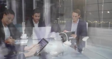 Animation of financial data processing over diverse business people. Global business digital interface technology and networking concept digitally generated video.