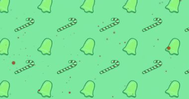 Yeşil arka planda ilerleyen yılbaşı desenlerinin üzerine konfetilerin düşüşü. Noel, şenlik, kutlama ve gelenek konsepti dijital olarak oluşturuldu.