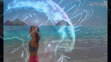 Kumsala ayak basan at kuyruğu bağlayan bir kadın. Dijital dünya gibi geriye doğru uzanıyor. Fitness için dönüyor. Sağlık, sağlık, açık hava, zindelik, zindelik, teknoloji, uyum