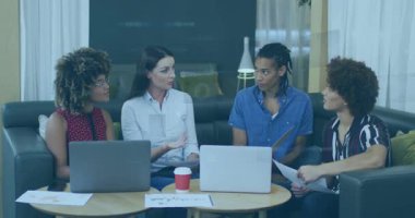 Animation of financial data processing over diverse business people. Global business, finances, computing and data processing concept digitally generated video.