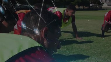 Stadyumdaki çeşitli ragbi oyuncuları üzerinden eldiven takılan bağlantıların animasyonu. Dijital olarak oluşturulmuş küresel bağlantılar, spor ve dijital arayüz kavramı.