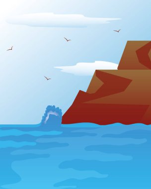 Büyük dalgalar ve uçan martılarla deniz kıyısındaki kayaların olduğu bir manzara.