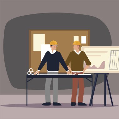 İnşaatçılar ve mimarlar ofisteki inşaat projesini tartışıyorlar.