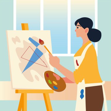 Resim sınıfı, kadın öğrenci stüdyoda soyut resim çiziyor.