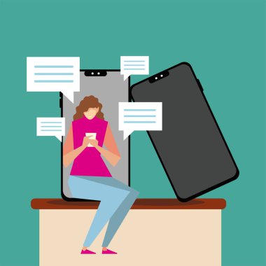 Genç bir kadın akıllı telefon teknolojisi kullanarak oturuyor.