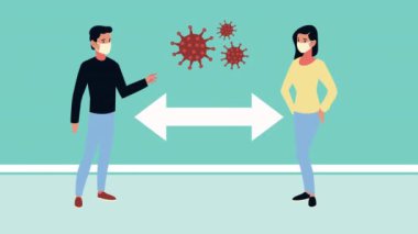 Tıbbi maske takan çift ve sosyal mesafeli 19 parçacık.