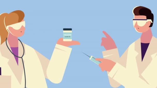 Lekarze para z fiolką szczepionki i strzykawką — Wideo stockowe