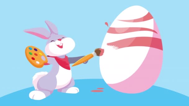 Χαρούμενη κάρτα Πάσχα με χαριτωμένο κουνέλι ζωγραφική αυγό — Αρχείο Βίντεο