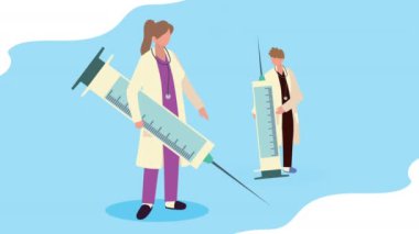 Doktor ve aşı şırıngaları.